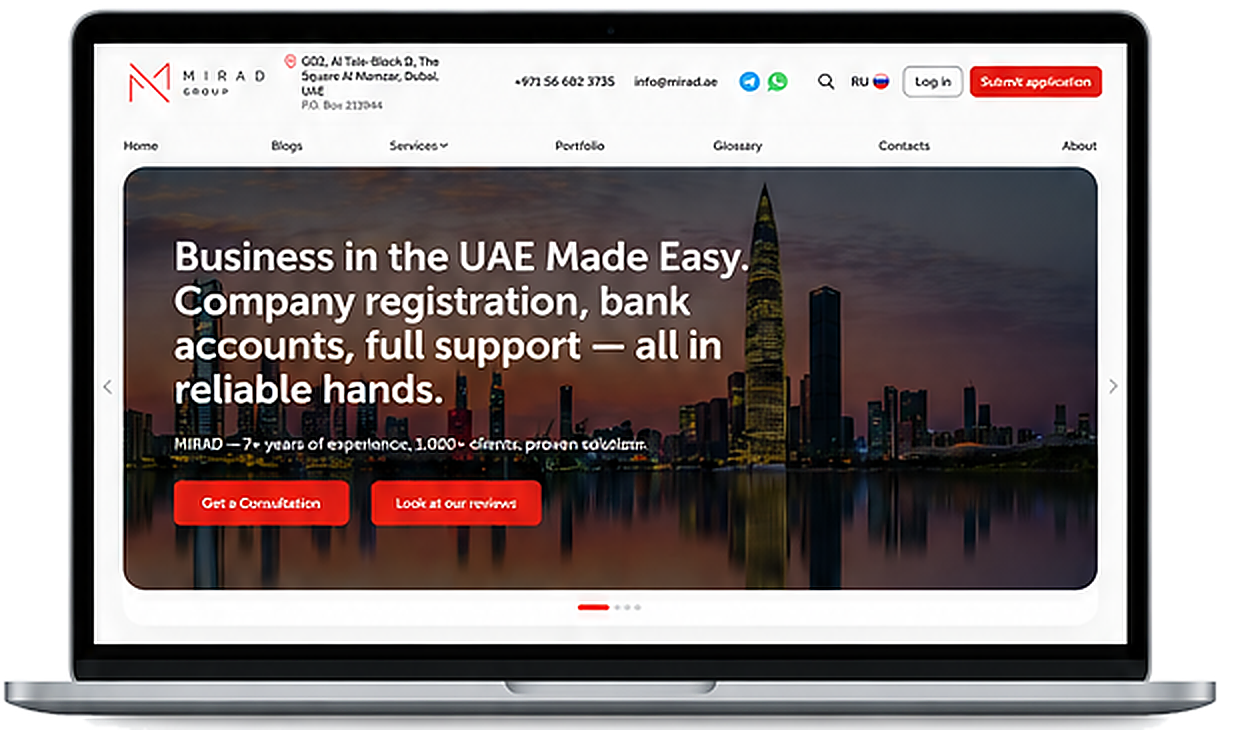 MIRAD.AE website displayed on a laptop